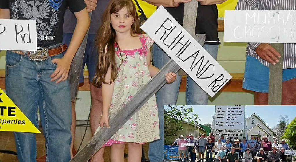 STOP SIGN: Ruhland Rd was represented on Declaration Day by young Piper Ruhland. INSET: All those who attended Declaration Day in Rosewood. STOP SIGN: Ruhland Rd was represented on Declaration Day by young Piper Ruhland. INSET: All those who attended Declaration Day in Rosewood.